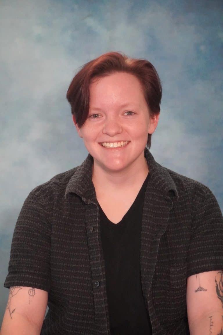 Headshot of J Tucker